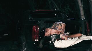 Scissoring interracial fuck with orgasms in a pickup truck