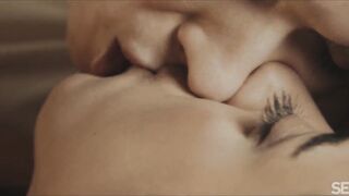 Lesbian duo enjoys glamorous lovemaking on a big bed